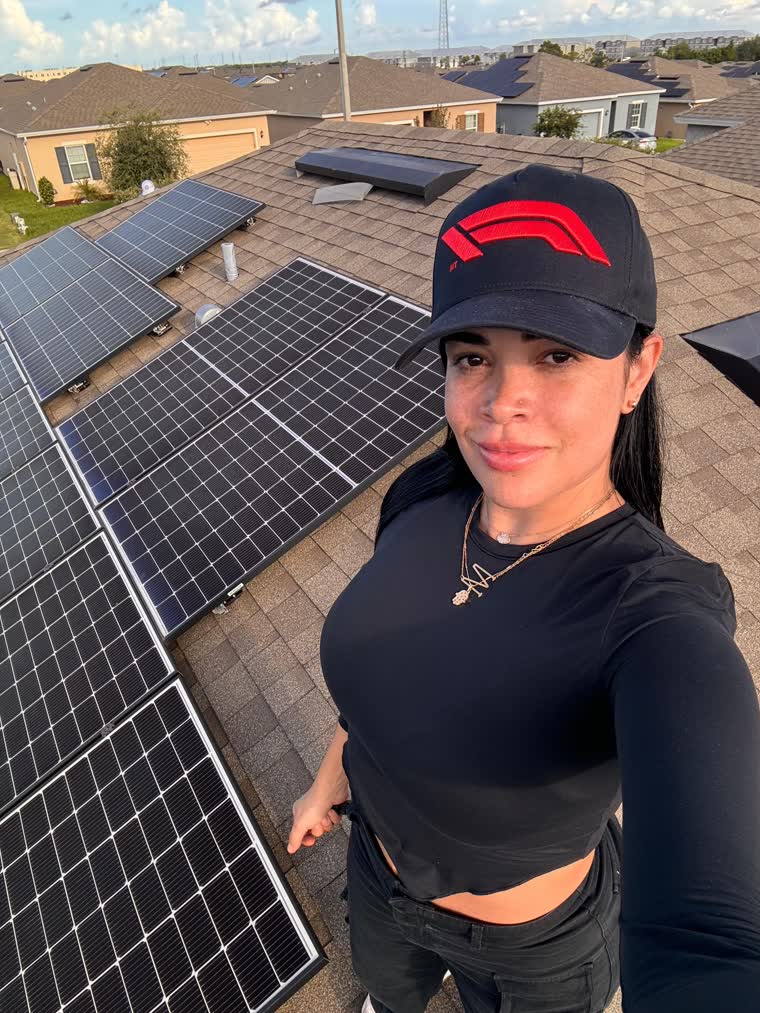 María Adriani, licensed public adjuster, inspecting a roof in Florida
